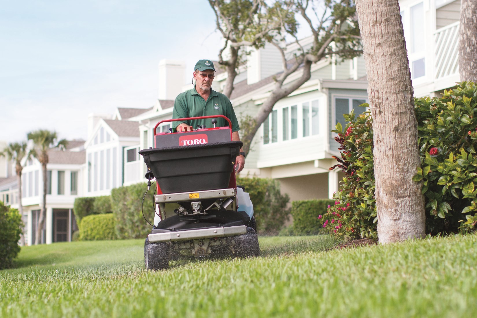 Turf Renovation made easy with the Toro Stand-on Spreader Sprayer